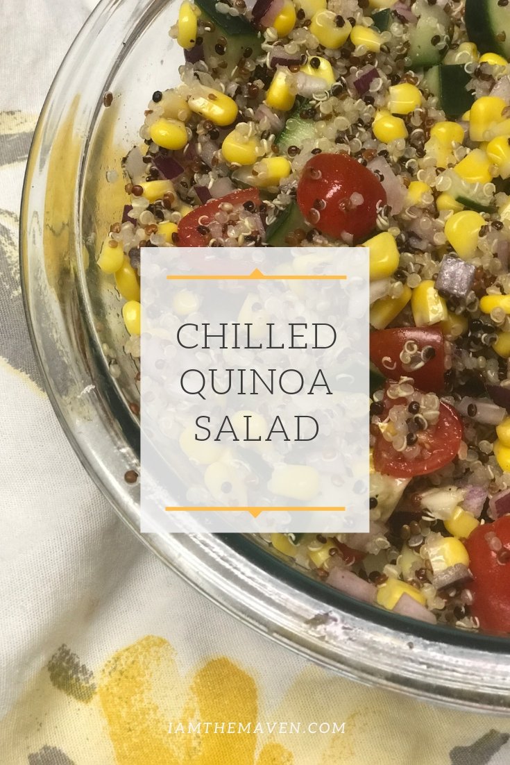 glass bowl of quinoa salad with onions, corn, tomatoes
