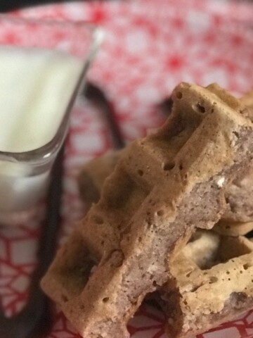 hot chocolate waffles and dip on a red plate