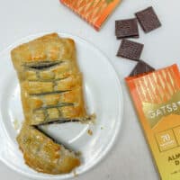 puff pastry wrapped around gatbsy chocolate on a white background