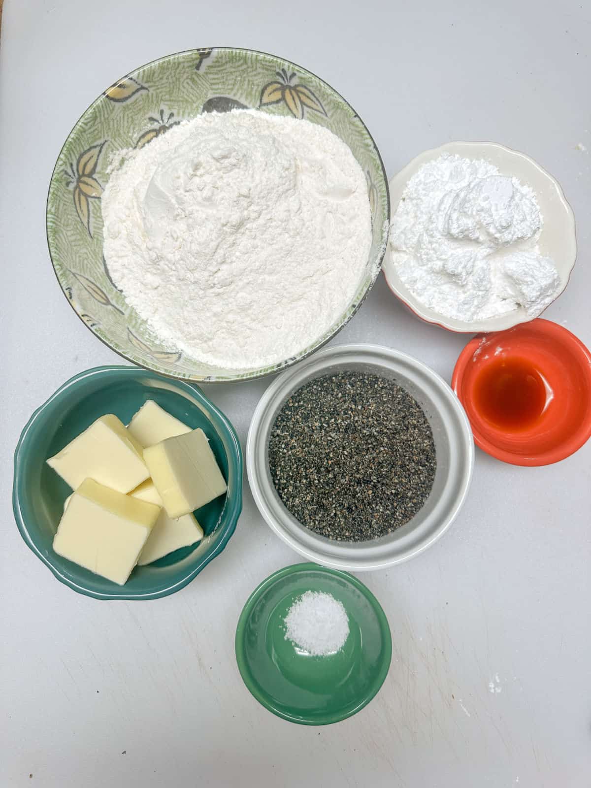 bowls of ingredients for black sesame seed shortbread
